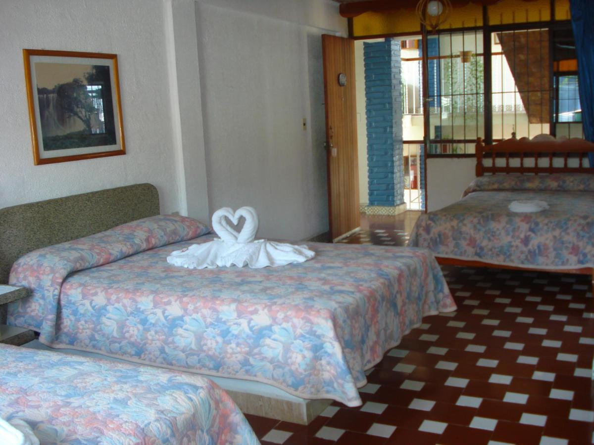 Arcos Hotel Катемако Экстерьер фото