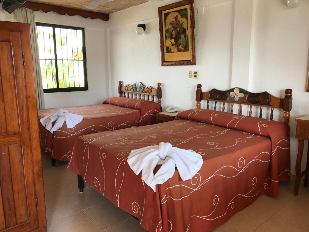 Arcos Hotel Катемако Экстерьер фото