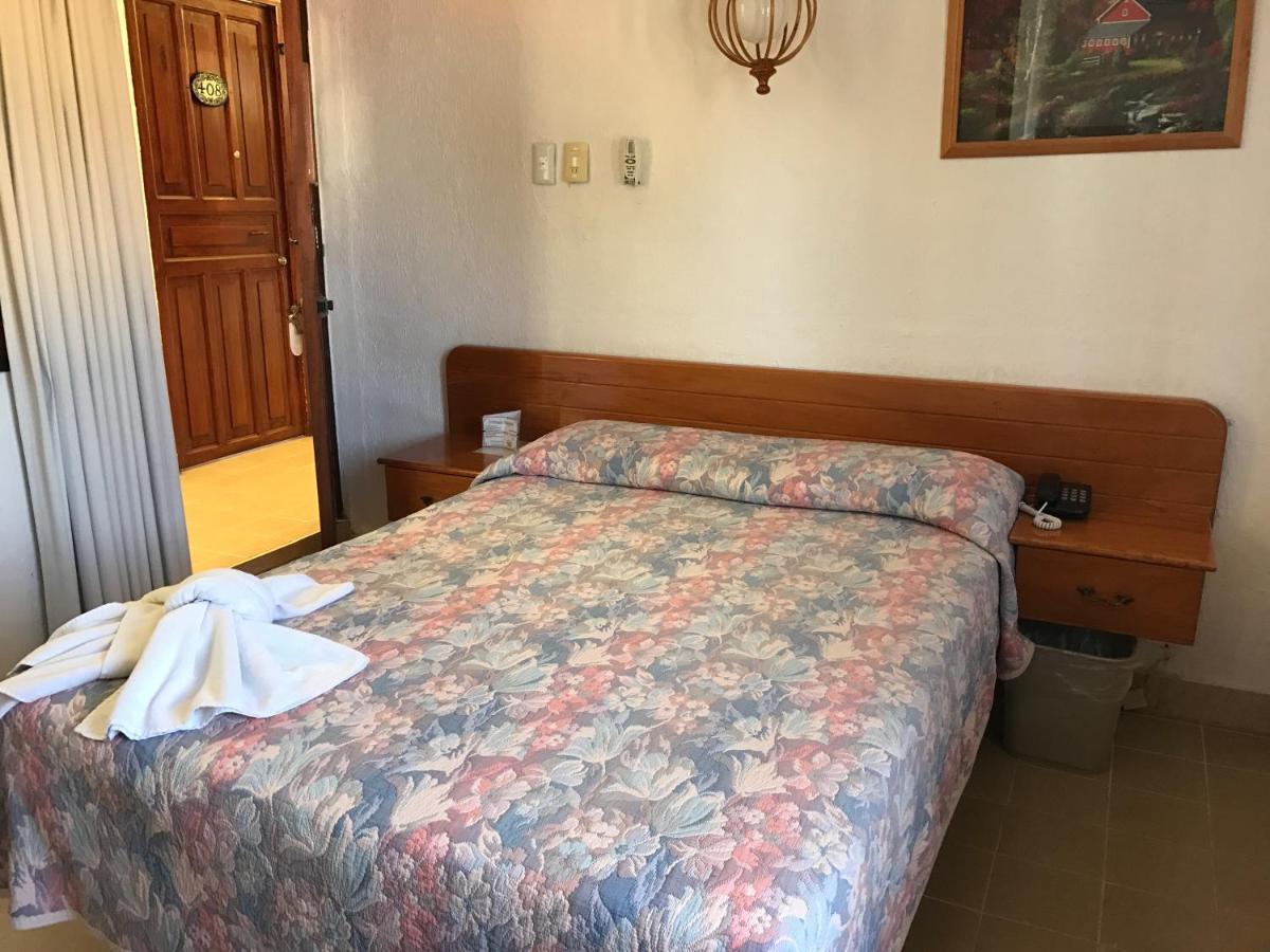 Arcos Hotel Катемако Экстерьер фото