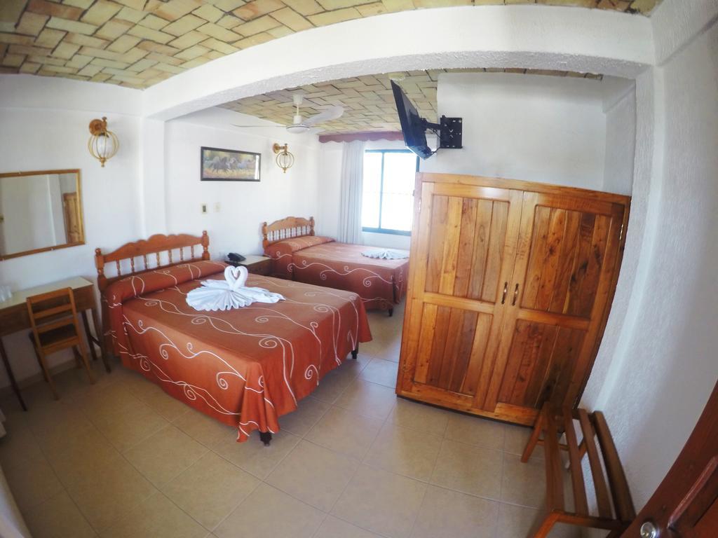 Arcos Hotel Катемако Экстерьер фото