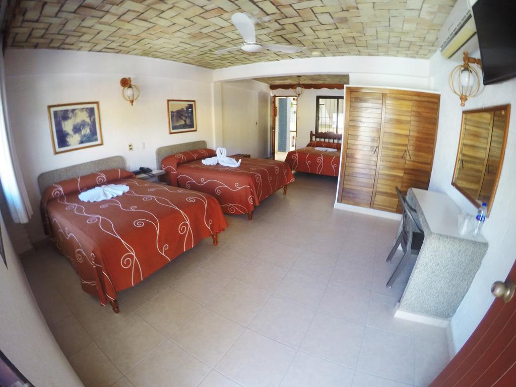 Arcos Hotel Катемако Экстерьер фото