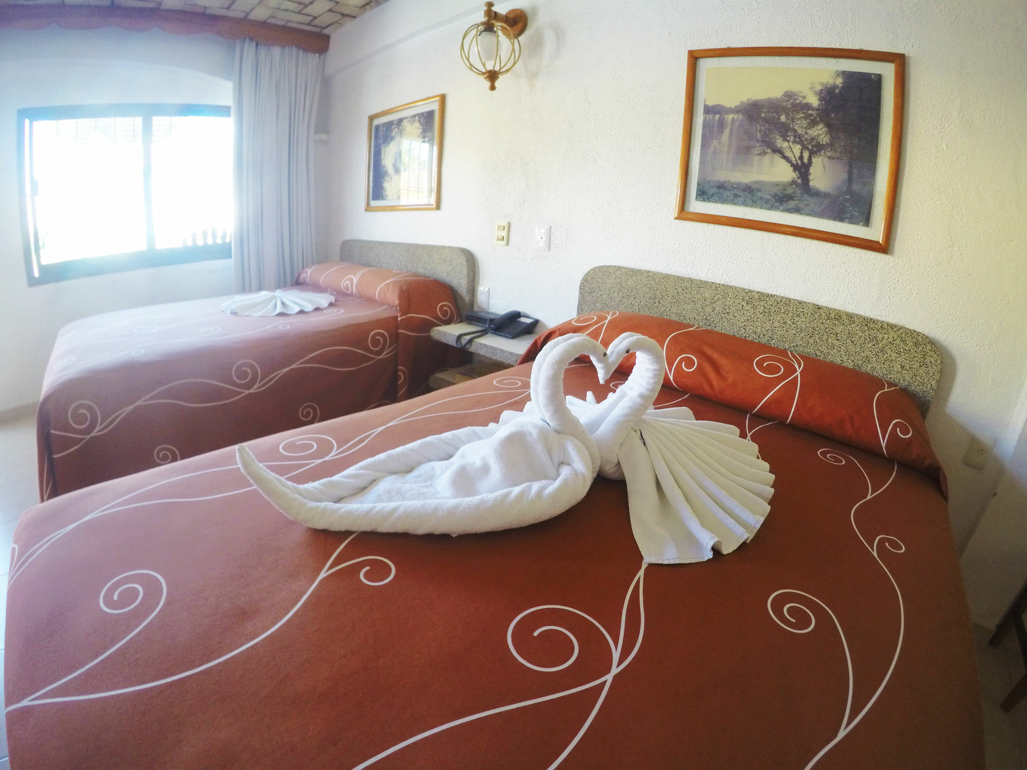 Arcos Hotel Катемако Экстерьер фото